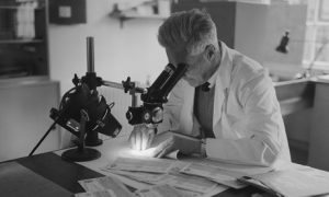 scientist-with-microscope